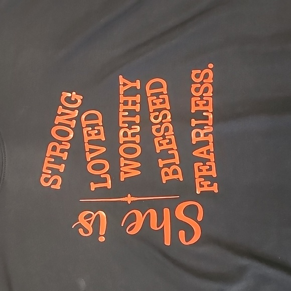 Black T, shorter in the front, soft, She is Strong - Picture 2 of 6